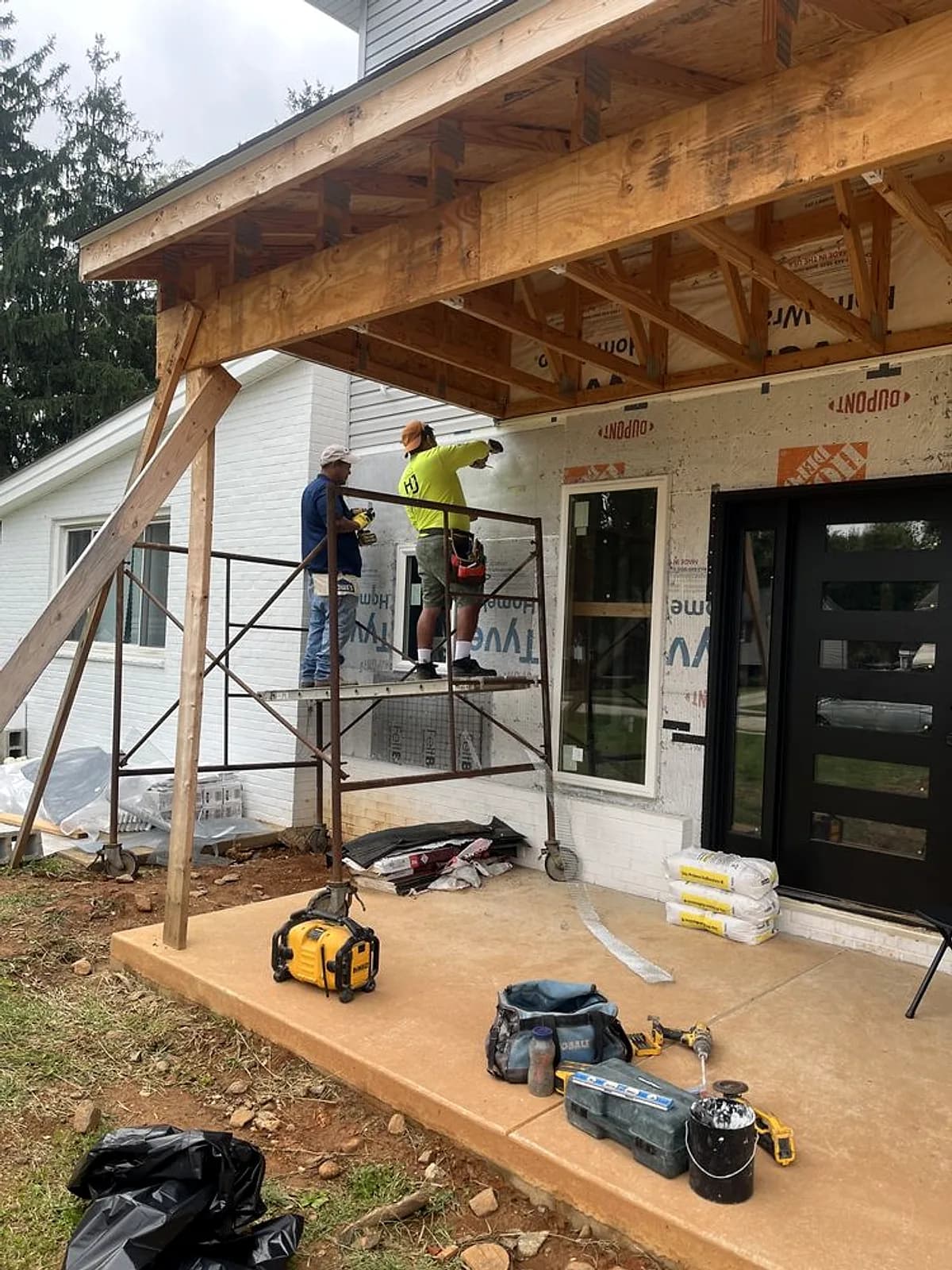 Poured concrete porch slab and covered-porch build by HJ Construction — Baltimore area, MD.