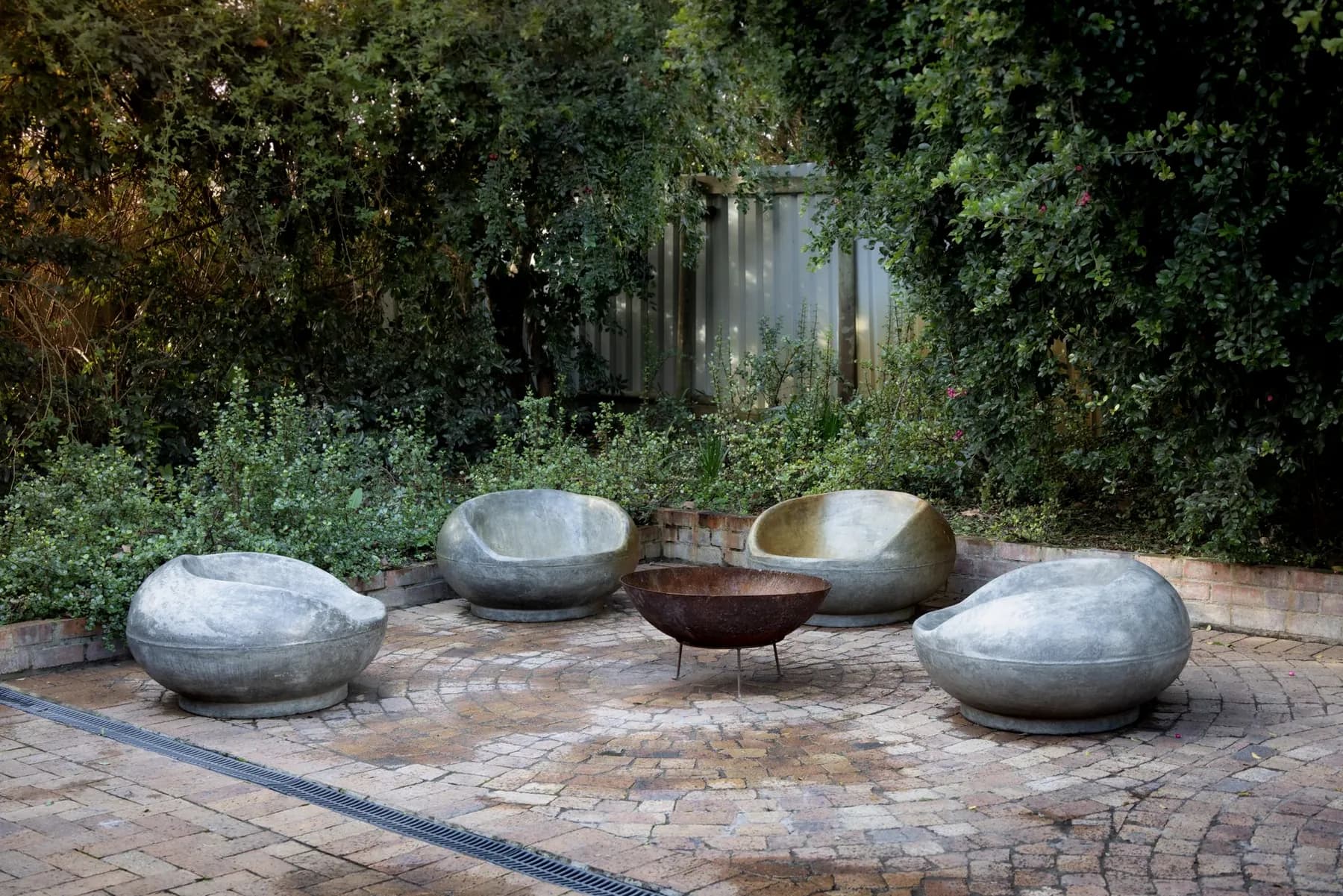 Custom stone fire pit with seating — Baltimore area, MD.